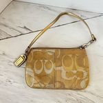 Coach Wristlet Zip Closure Gold And Silver Tone Treads Pink Lined Photo 1