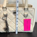 Betsey Johnson | Ivory Quilted Bag w/ Crossbody Strap & Iconic Bag Charm Photo 11