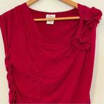 Oh Baby Maternity pink short sleeve ruched shirt with flower detail Size undefined Photo 3