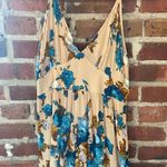 Vestique Romper Photo 1