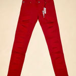 Tripp NYC  Z-Cut Strappy Skinny Jeans In Red Photo 0