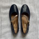 Clarks  Helina Amo Mary Jane flat in navy blue leather with a gold-tone strap. Photo 5
