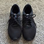 Nike  Women's Tanjun Sneakers size 12 Photo 1