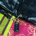Coach
Black Patent Leather Clutch Photo 12