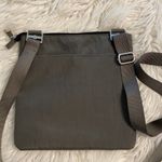 Baggallini Baggalini Shoulder Bag BNWOT color gray adjustable stripe lots of zippers Photo 6