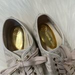 Michael Kors  Logo Off white/cream tennis shoes with gold hardware Photo 1