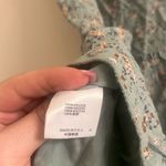 Brandy Melville Cara Ruffle One Size Skirt in Green Floral Photo 6