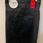 Spanx  half slip in black. NWT. #10179R tummy control panel. 1 small and 1 medium Photo 0