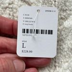 Free People  Women's Sleeveless Sweater Vest Color Ivory Size L. NEW Photo 5