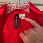 Dreamgirl  red satin finish shorty belted robe.​ Photo 1