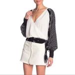 Free People  Auxton Thermal Wrap Top with a floral print Photo 11