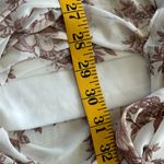 No Comment Chic White Maxi Dress with Brown Floral Design Photo 10