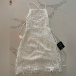 Lulus Lulu’s Making Magic White Fringe Lace-Up Mini Homecoming Dress Photo 1