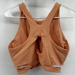 Athleta  Conscious Cut Out Sports Bra High Racerback Powervita Bright Peach L Photo 3