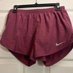 Nike  Women's Maroon-ish Purple Athletic Shorts Photo 0