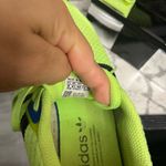 Adidas Neon Green Athletic Shoes with Black Stripes Photo 6