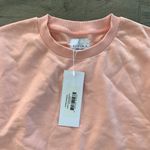 Camilla Allfenix  peach sweater Photo 1