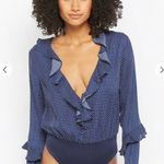 NUDE Polka Dot Ruffle Long Sleeve Thong Bodysuit Photo 6
