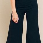 Blue Blush Vestique Black Ruffle Romper Photo 0