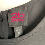 Bebe ⭐️   • Black & White Chiffon Studded Open Back Top Photo 2