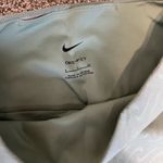 Nike  Dri-Fit One Icon Clash Mid-Rise Printed Leggings Photo 4