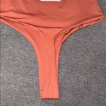 Meshki  bodysuit Kamora one shoulder cami strap thong Large sierrra Large NeW Photo 4