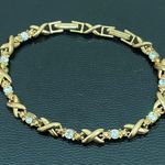 XOXO Vintage AVON Gold-tone Hugs & Kisses Rhinestones Tennis 8” Bracelet Photo 7