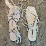 SheIn New white sandals size 11
Tie around sandals Photo 3