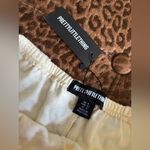 Pretty Little Thing  Yellow Shorts Photo 2