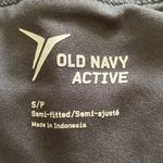 Old Navy Gray athletic shorts, attached underpants, shorts have been cleaned and sanitized, black and gray cheetah print Along waistband, excellent condition, size small, waistband is 15 inches side to side Photo 5