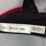 Victoria's Secret Victoria’s Secret VSX Padded Sports Bra in Pink with Black trim. Photo 6
