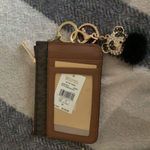 Michael Kors  wallet with keychain attached Photo 1