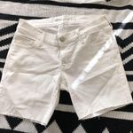 Old Navy Low rise  rockstar denim jean shorts with frayed raw hem. Photo 0
