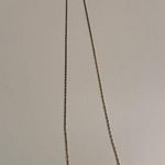 Gold and rhinestone bar necklace Photo 0