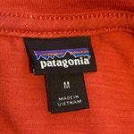 Patagonia  Cinnamon Red 3/4 Sleeve Size Medium Outdoorsy Hiking Pocket Tee Shirt. Photo 3