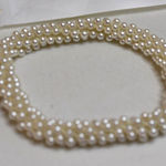 Source Unknown NIP Dainty Prom Bridal Party Twisted Layed Cream Faux Peart 6" Stretch Bracelet Photo 0