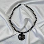 Early 2000's Geometric Black Cream Beaded Swirl Pendant Necklace Photo 2