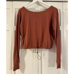 FLX urban commuter cinch hem cropped long sleeve top size small Orange Photo 2