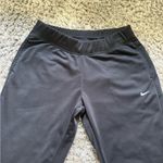 Nike  brand women's athletic pants, slightly flared, size M Photo 1