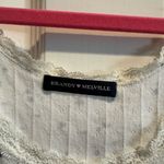 Brandy Melville  White Floral Tank Top Photo 1