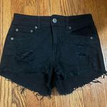 American Eagle Size 4 black shorts with some rips. Photo 0