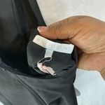 Chic Black Backless Dress with White Bow Details Photo 4