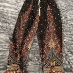 Kathmandu Imports Bohemian Black and Orange Patterned Pants One size fits S-L By Kathmandu  Photo 0