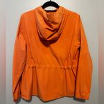 Lululemon Athletica Orange Raincoat with Hood and Water-Resistant Fabric Photo 15