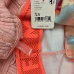 Free People Movement NWT  All That Printed Set Set In Assort Combo  Size: Xs  Shoulder Length- 16. Inch  Top to Bottom Front- 34inch  Top to  Back- 37 inch  Waist- 13 inch  No refunds or cancellations Photo 1