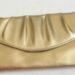 NWOT ladies gold clutch purse Photo 0