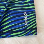 Reebok  size small blue and green print cropped leggings inside pocket  EUC Photo 10