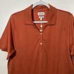 Ashworth  Women’s Golf Polo Shirt in Burnt Orange Size Large Photo 1