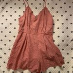 Vestique Romper Photo 1