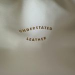 Understated Leather Crescent Clutch Photo 3